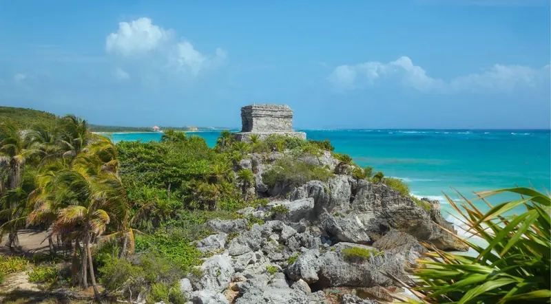 Tulum ruins on the limestone cliffs overlooking turquoise water
